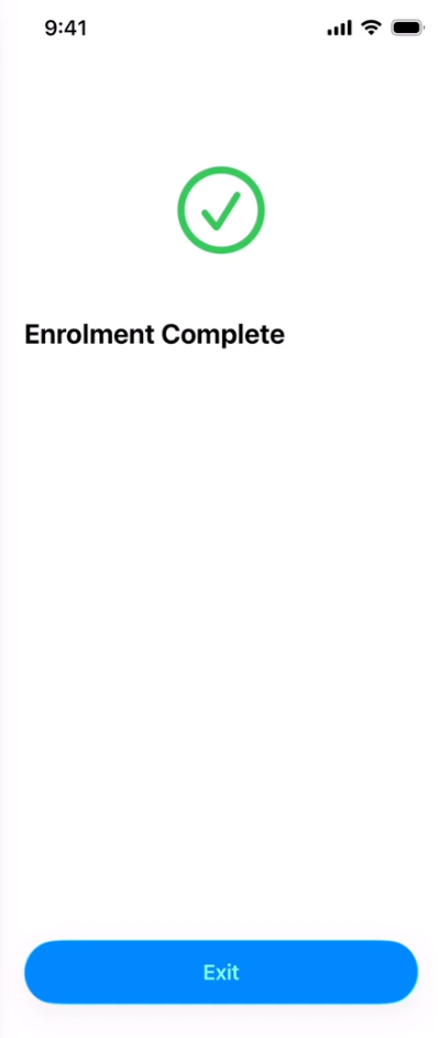 Device screen confirming enrollment is complete.