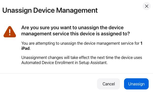 a modal in apple business showing you are unassigning devie management.png